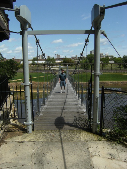 On the bridge looking at the abandoned train yards and buildings  that once employed many people years ago.